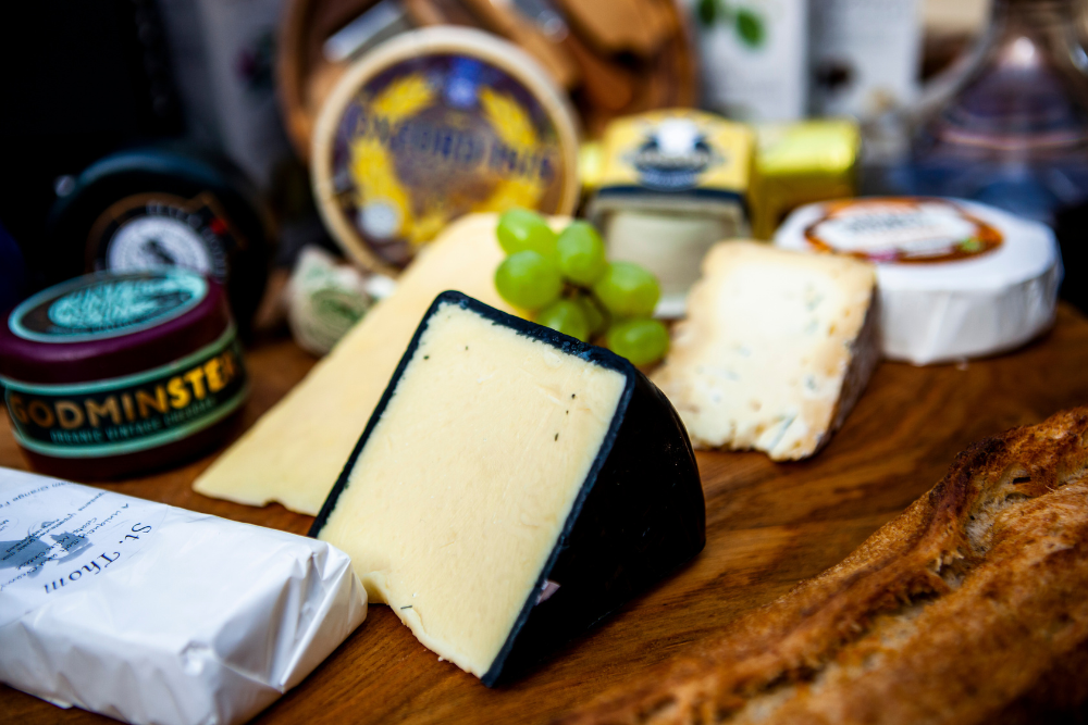 A cheeseboard containing premium cheeses
